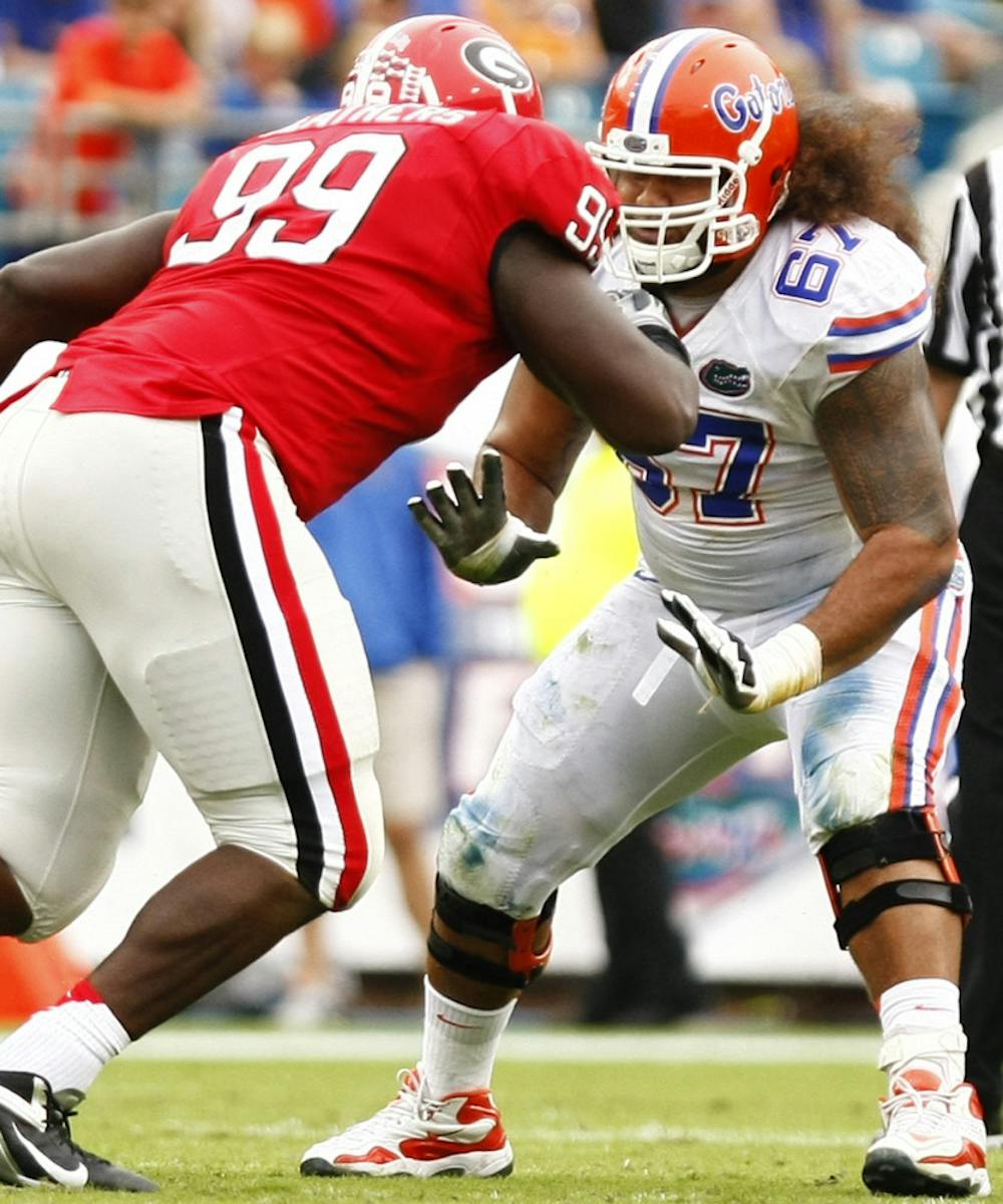 <p>Guard Jon Halapio blocks Georgia nose tackle Kwame Geathers in Florida’s 17-9 loss on Oct. 27 at EverBank Field in Jacksonville.</p>