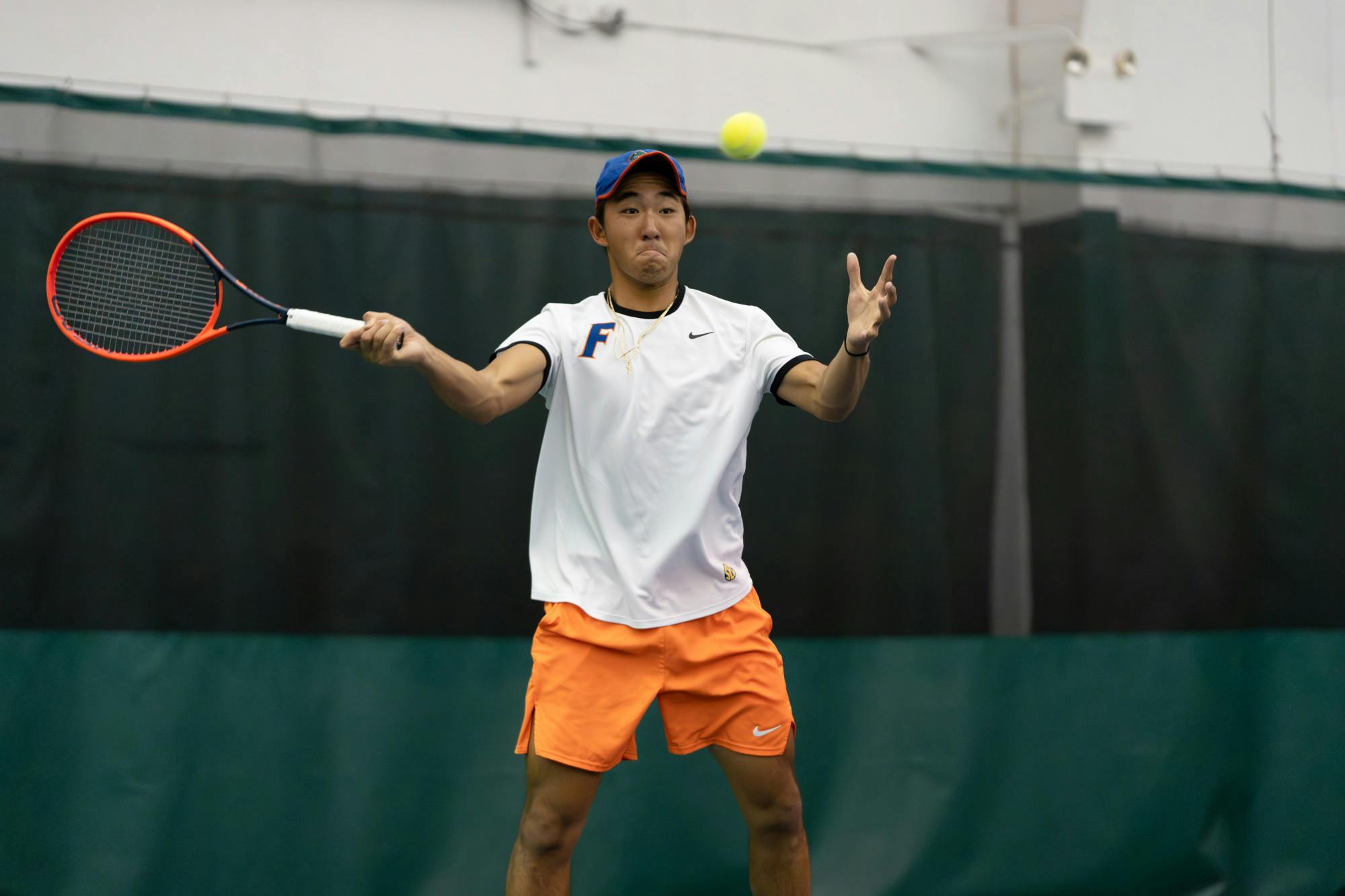 Gator tennis player Jeremy Jin keeps his eye on the ball in a match against Ole Miss on Friday, March 22, 2024.
