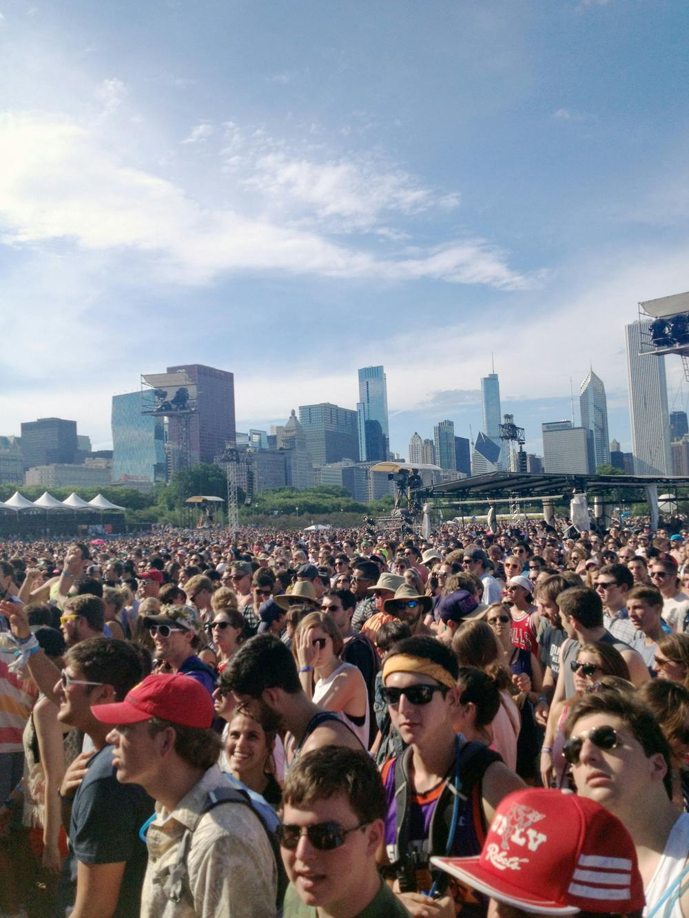 A crowd of Lollapalooza festival-goers wait for the next act to grace the stage in Grant Park in Chicago. The three-day festival will be held Aug. 1 to 3.