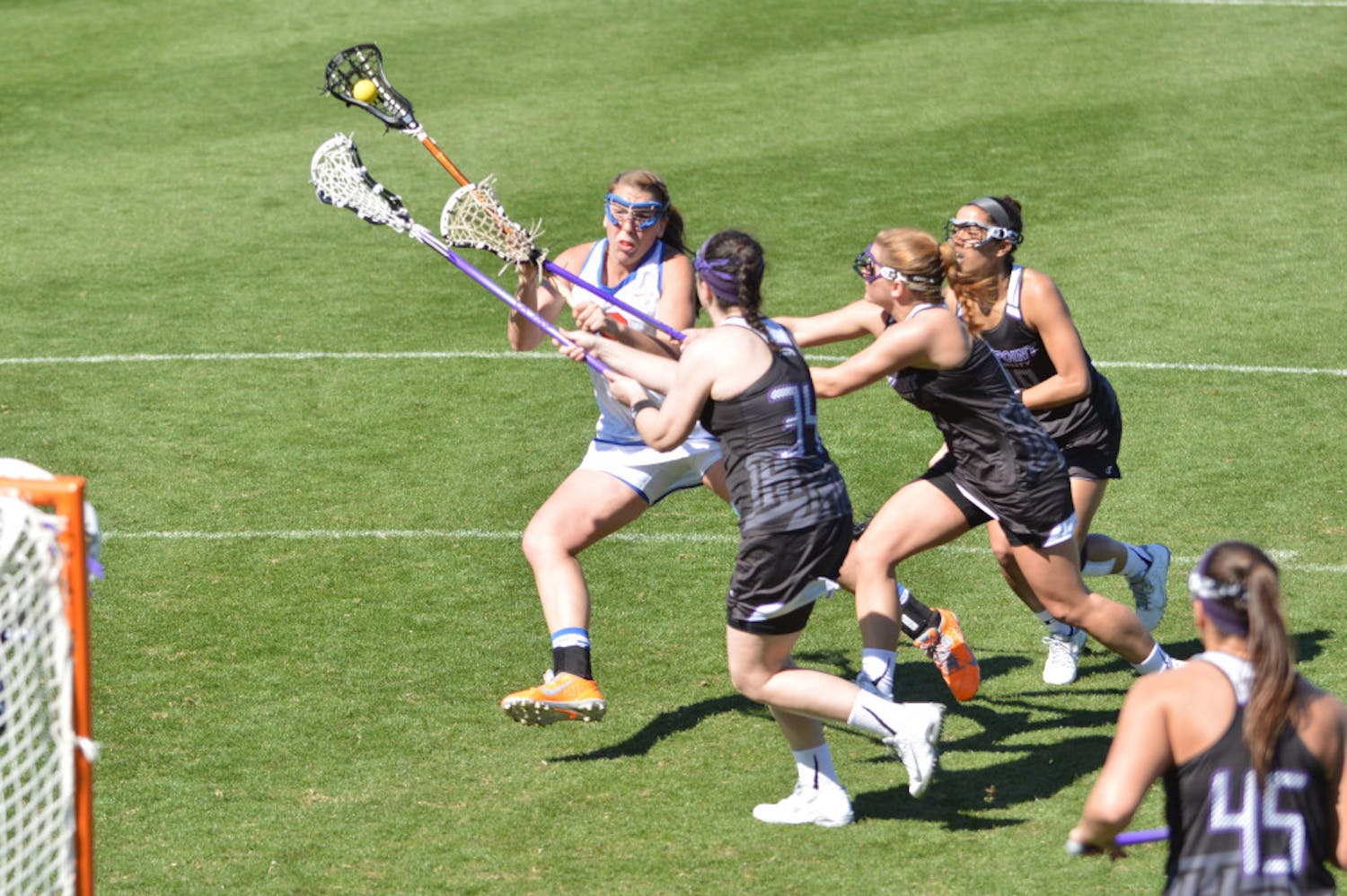 Shannon Gilroy attempts a shot during Florida's 18-7 win against High Point on Saturday in Donald R. Dizney Stadium. The junior midfielder set UF single-game records for draw controls (10), goals (8) and shots (13) against the Panthers.