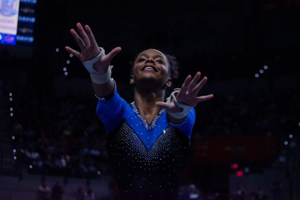 <p>Senior Trinity Thomas took to the floor and earned the 12th perfect 10 of her career Friday night against Kentucky. </p>