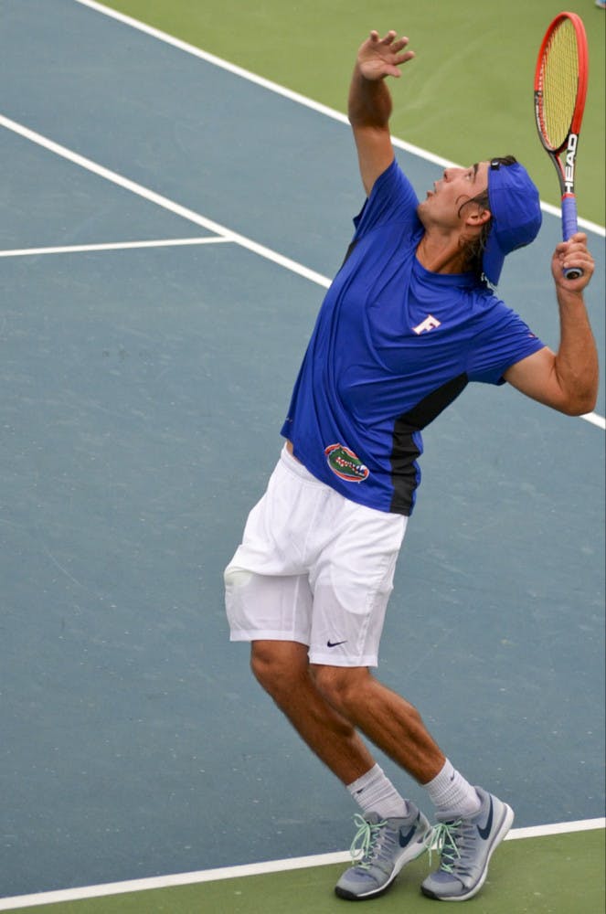Diego Hidalgo prepares to serve during the SEC Fall Classic at UF's Ring Tennis Complex