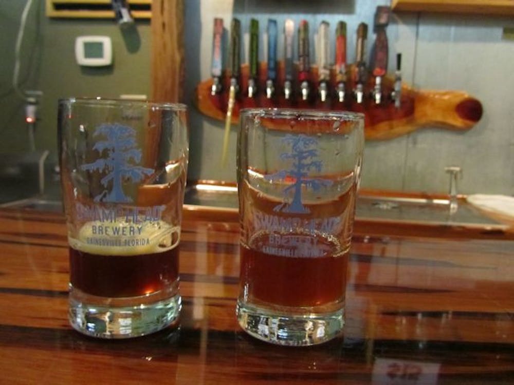 <p>Swamp Head Brewery, along with Tampa's Cigar City Brewing, released two barely wine ales Wednesday: Church on a Hill (left) and Roosevelt.</p>
