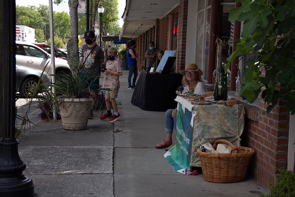 Linda Lockman creator of Woods and Tides Designs makes handmade jewelry using a piece of nature. Whether it be a shell, an acorn or a stone from a river, Lockman said she makes her artwork from things she’s collected. 
