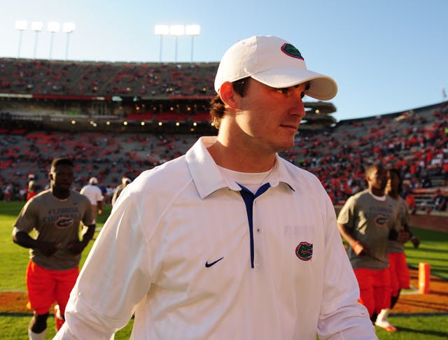 Florida starting quarterback John Brantley was still wearing a walking boot Saturday, but coach Will Muschamp said he hopes Brantley will return to practice next week.