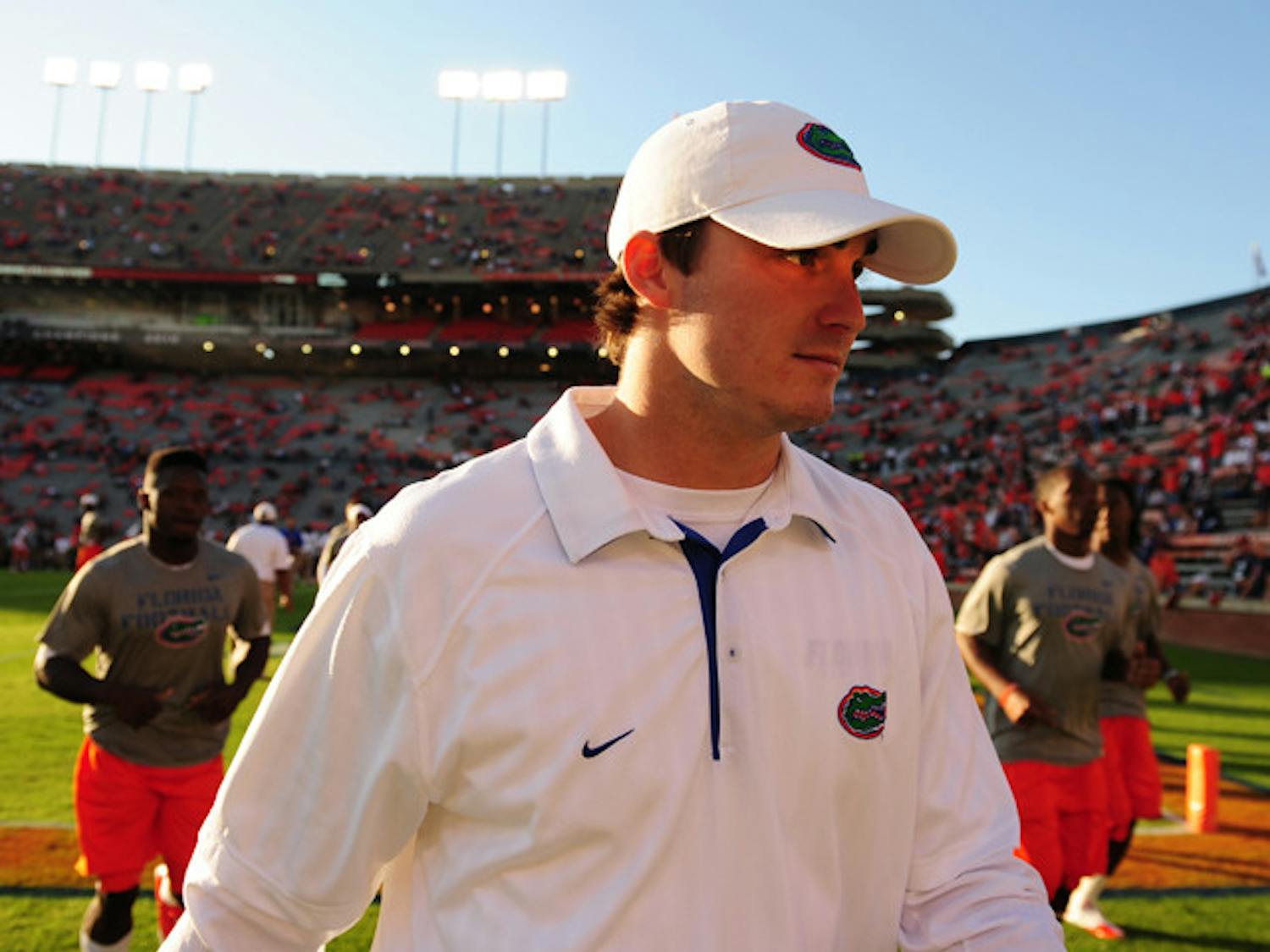 Florida starting quarterback John Brantley was still wearing a walking boot Saturday, but coach Will Muschamp said he hopes Brantley will return to practice next week.