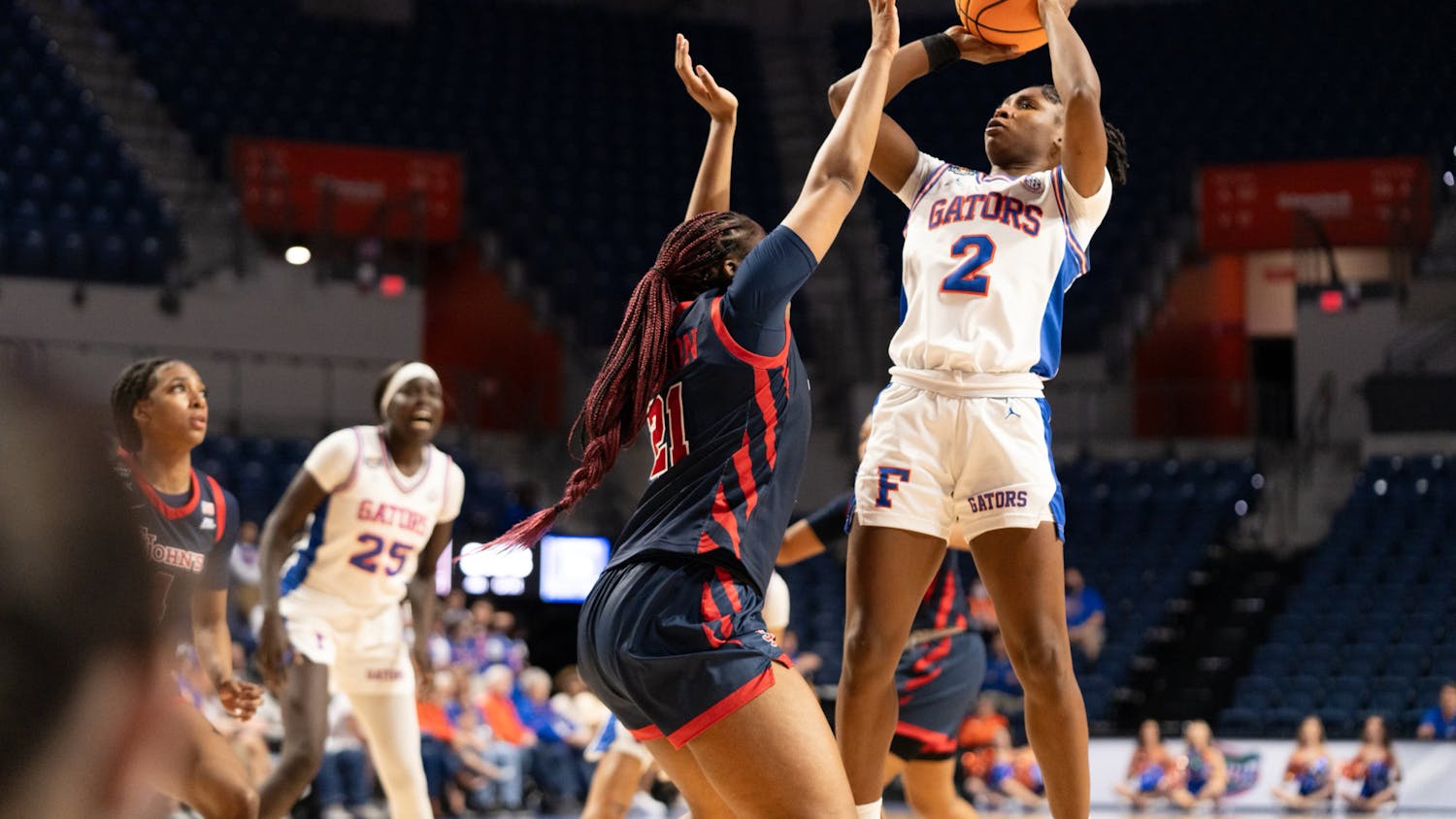 Gators women's basketball guard Aliyah Matharu shoots a jumper over a St.John's University defender in the team's loss to the Red Storm on Thursday, March 21, 2024. 