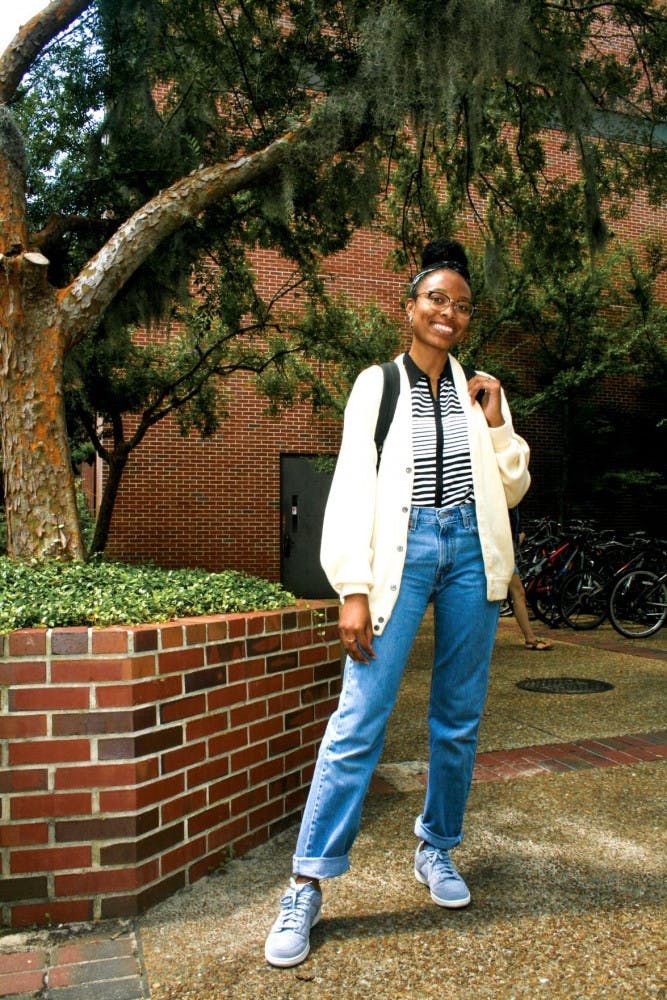 Vanessa Villarreal, 19, rocking a striped button-down, pastel cardigan, hoops and sneakers. Her friends call her a fashion icon, but Villarreal modestly says she gets her fashion inspiration from Instagram.