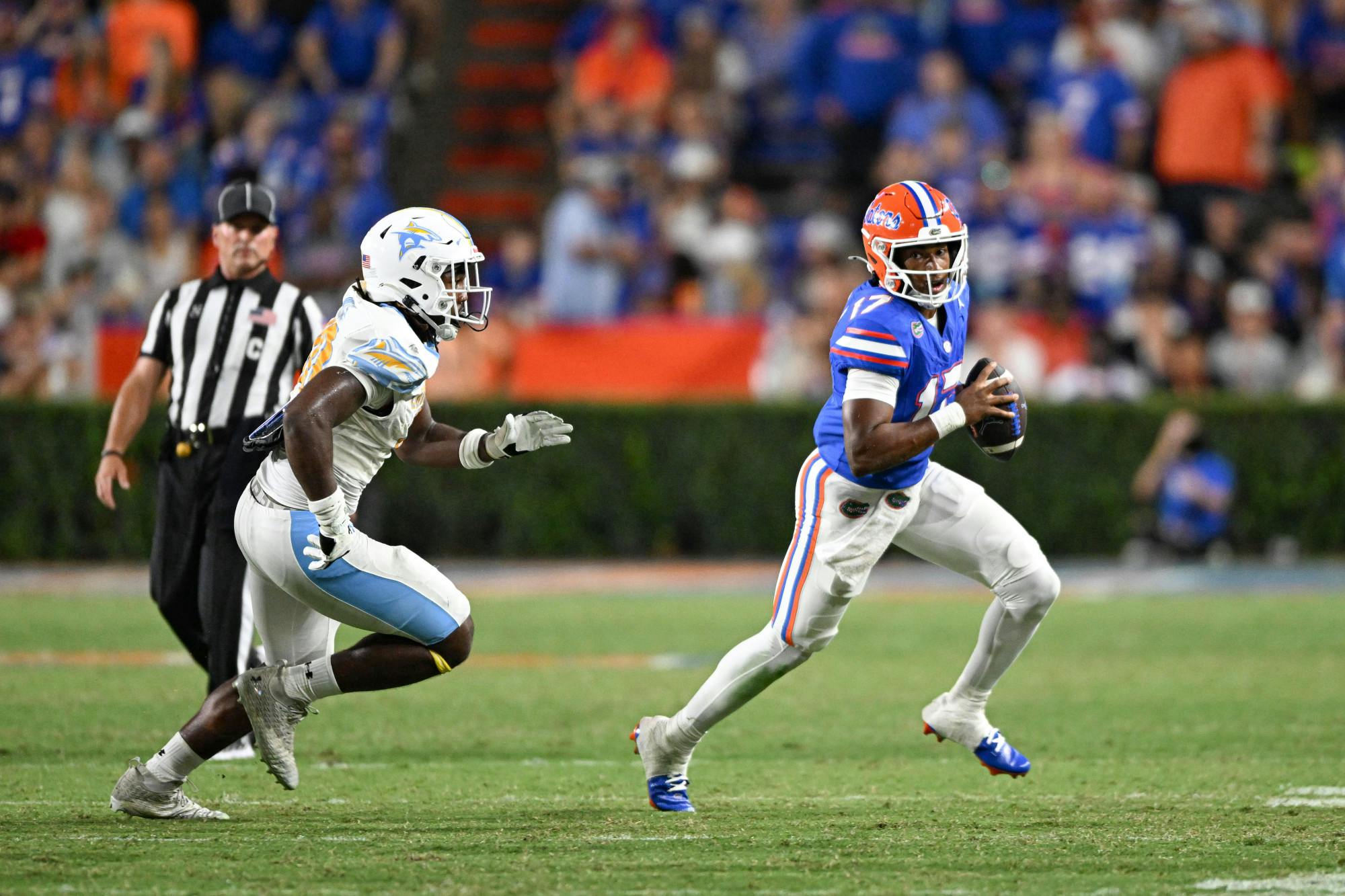 Florida Gators quarterback Tramell Jones Jr. (17) runs with the ball during a football game between the Long Island Sharks and the Florida Gators on Saturday, Aug. 30, 2025, at Ben Hill Griffin Stadium in Gainesville, Fla.