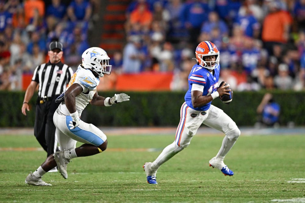 Florida Gators quarterback Tramell Jones Jr. (17) runs with the ball during a football game between the Long Island Sharks and the Florida Gators on Saturday, Aug. 30, 2025, at Ben Hill Griffin Stadium in Gainesville, Fla.