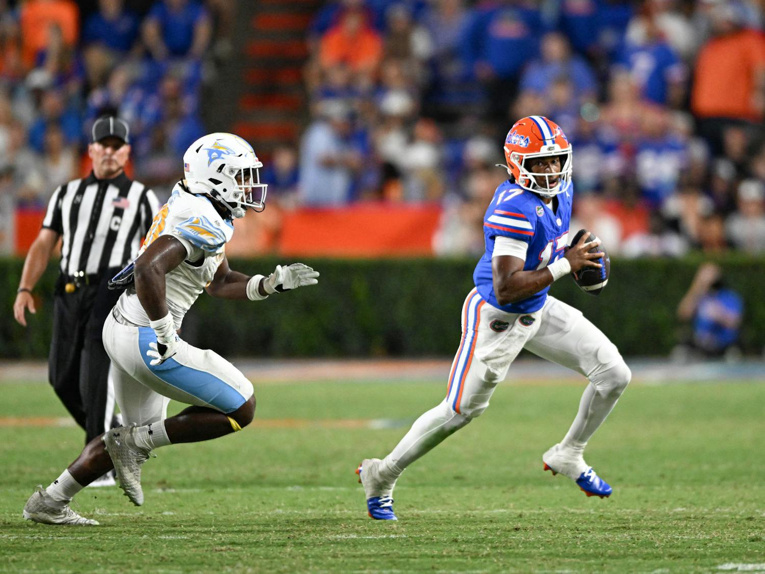 Florida Gators quarterback Tramell Jones Jr. (17) runs with the ball during a football game between the Long Island Sharks and the Florida Gators on Saturday, Aug. 30, 2025, at Ben Hill Griffin Stadium in Gainesville, Fla.