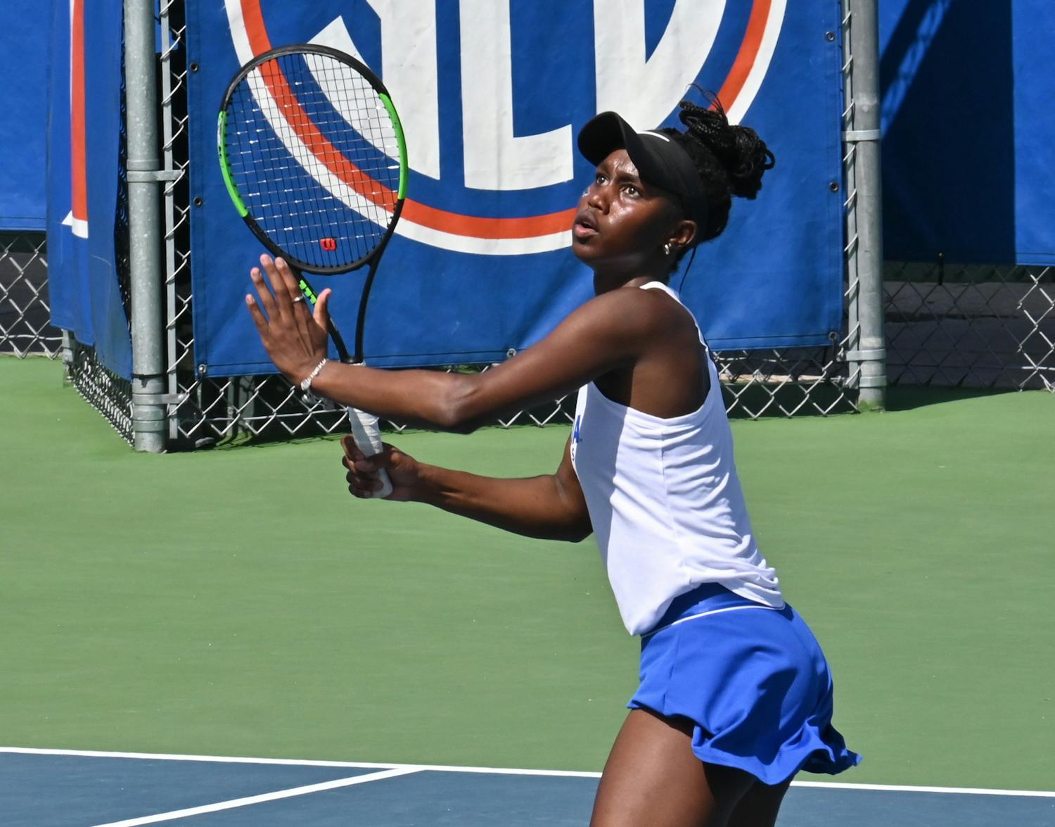 Florida&#x27;s Marlee Zein looks up for a serve during a match against Texas A&amp;M on Feb. 28. The Gators women&#x27;s tennis team were destroyed by Auburn, 6-1 Sunday afternoon.