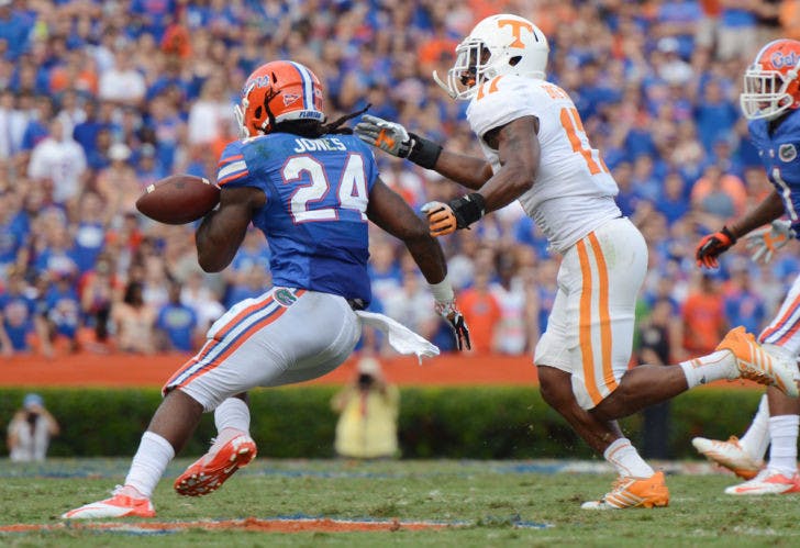 Matt Jones fumbles during Florida’s 31-17 victory against Tennessee on Saturday in Ben Hill Griffin Stadium. Coach Will Muschamp plans to split carries between Jones and Mack Brown moving forward this season.