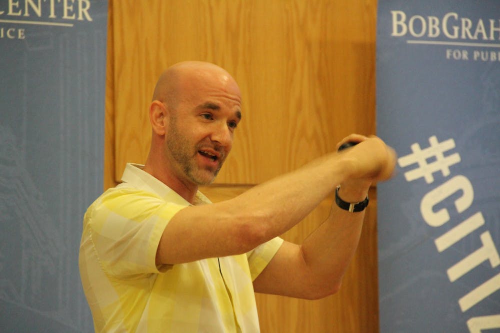 Matthew Schrier, a photojournalist who was held captive for seven months by al-Qaida, shared his story with an audience of about 70 people in Pugh Hall on Tuesday night.