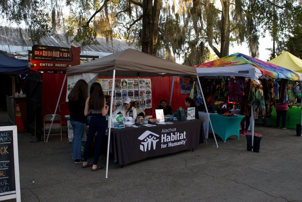 <p>Habitat for Humanity sits outside the High Dive during the Original Gainesville Food Truck Rally ﻿Saturday, Feb. 3, 2023. </p>
