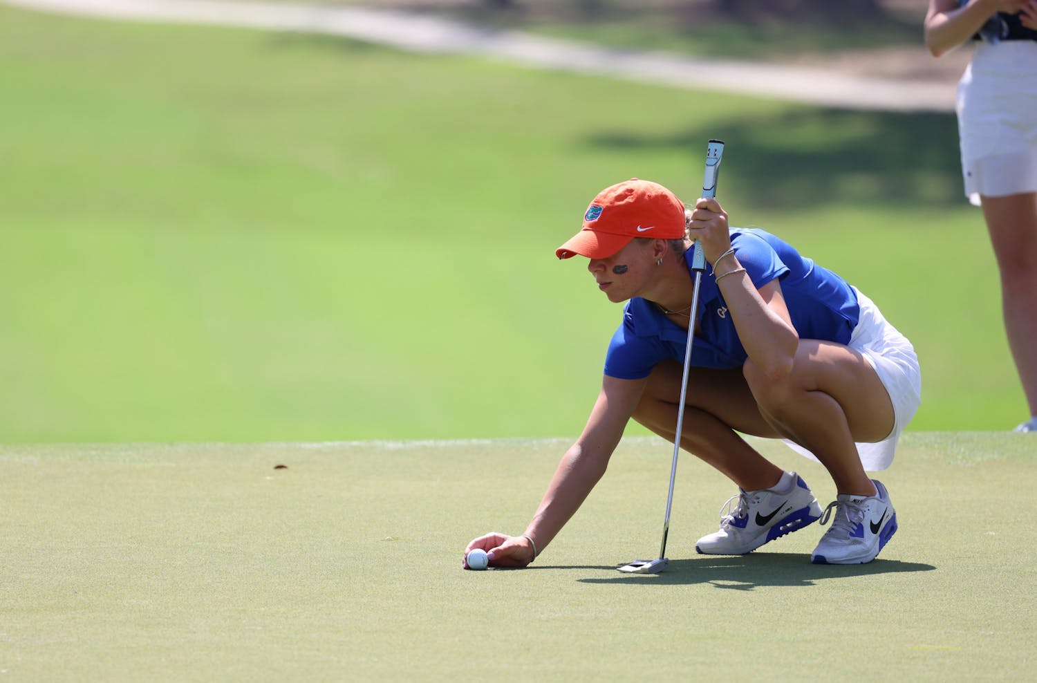 Florida senior Annabell Fuller lines up a putt in the VyStar Credit Union Gators Invitational Sunday, March 5, 2023.