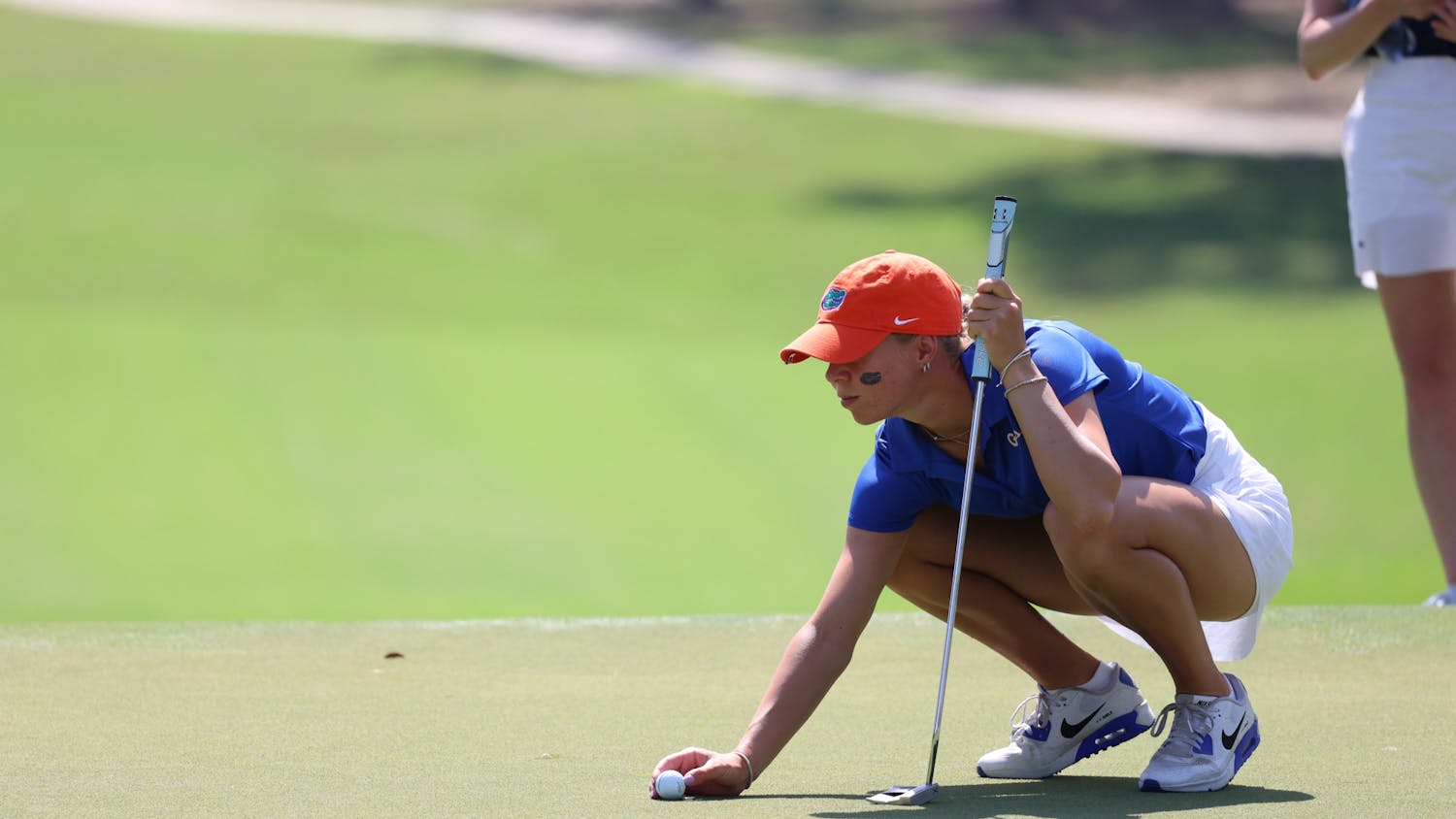 Florida senior Annabell Fuller lines up a putt in the VyStar Credit Union Gators Invitational Sunday, March 5, 2023.