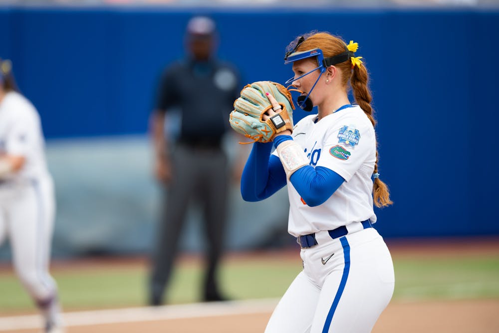 Florida Gators pitcher Katelynn Oxley (39) stares down a batter during the first game of the NCAA Women’s College World Series vs. the Texas Longhorns on Thursday, May 29, 2025, at Devon Park in Oklahoma City, Oklahoma.