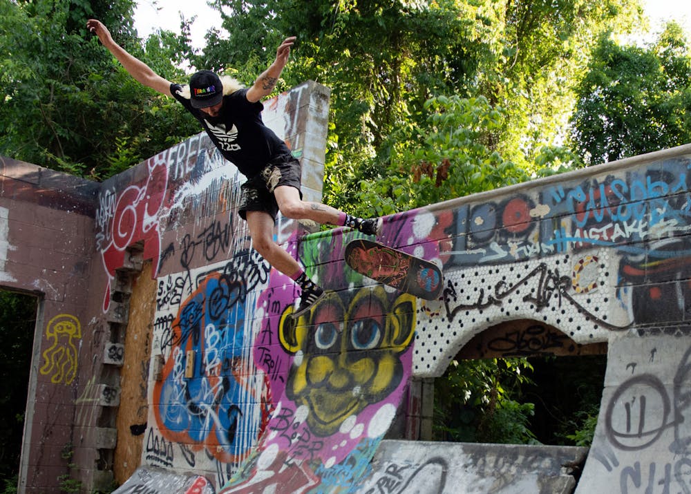 Josh Ketterer, 29, attempts a skate trick called a “50/50” at the Gentleman’s Club, a DIY skate park in Gainesville, Florida on Sunday, May 30, 2021. The skate park was built by skaters on private property and the city has ordered it to be torn down by June 20. 