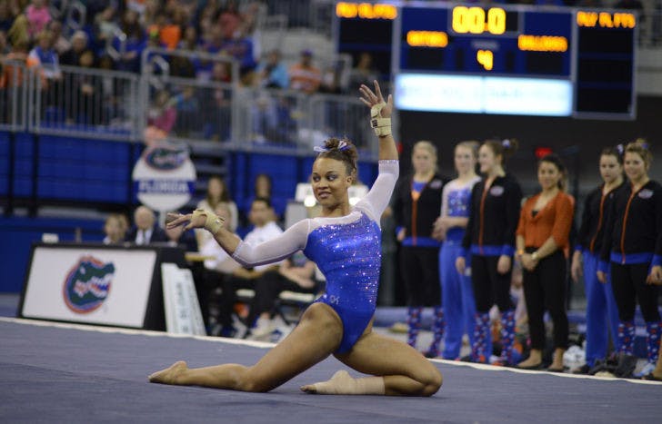 Kytra Hunter performs her floor routine on Friday in the O’Connell Center. Hunter scored a perfect 10 on the routine. Her performance followed fellow UF gymnast Bridget Sloan’s perfect floor routine — the first back-to-back 10s in an event for UF in almost 18 years.