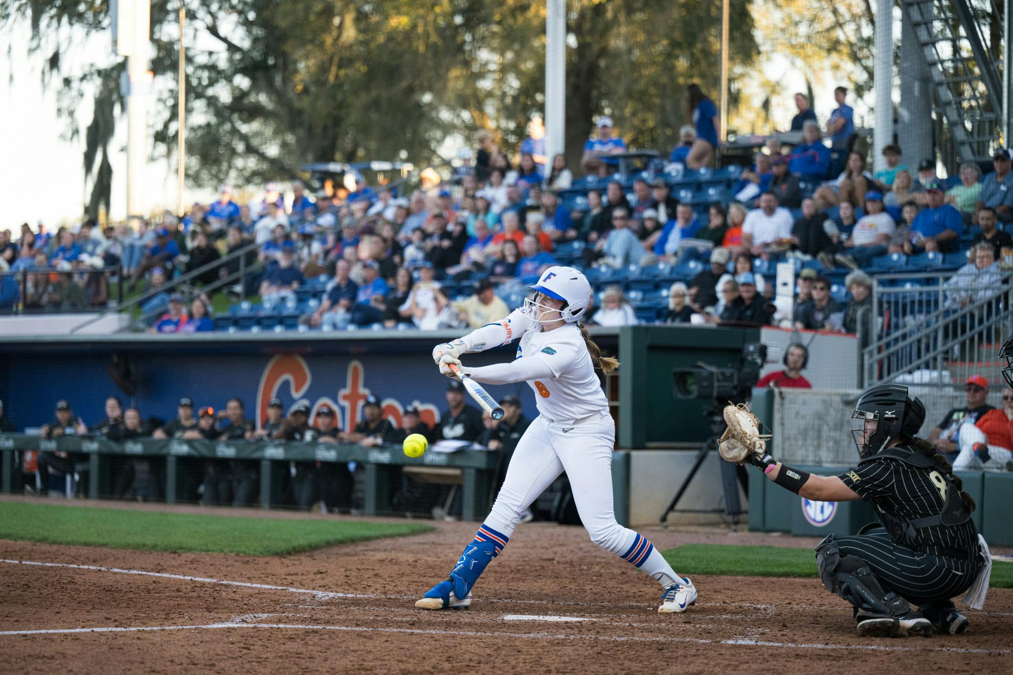 Florida Gators catcher Jocelyn Erickson (8) swings in a softball game against UCF in Gainesville, Fla., on Wednesday, March 12, 2025.