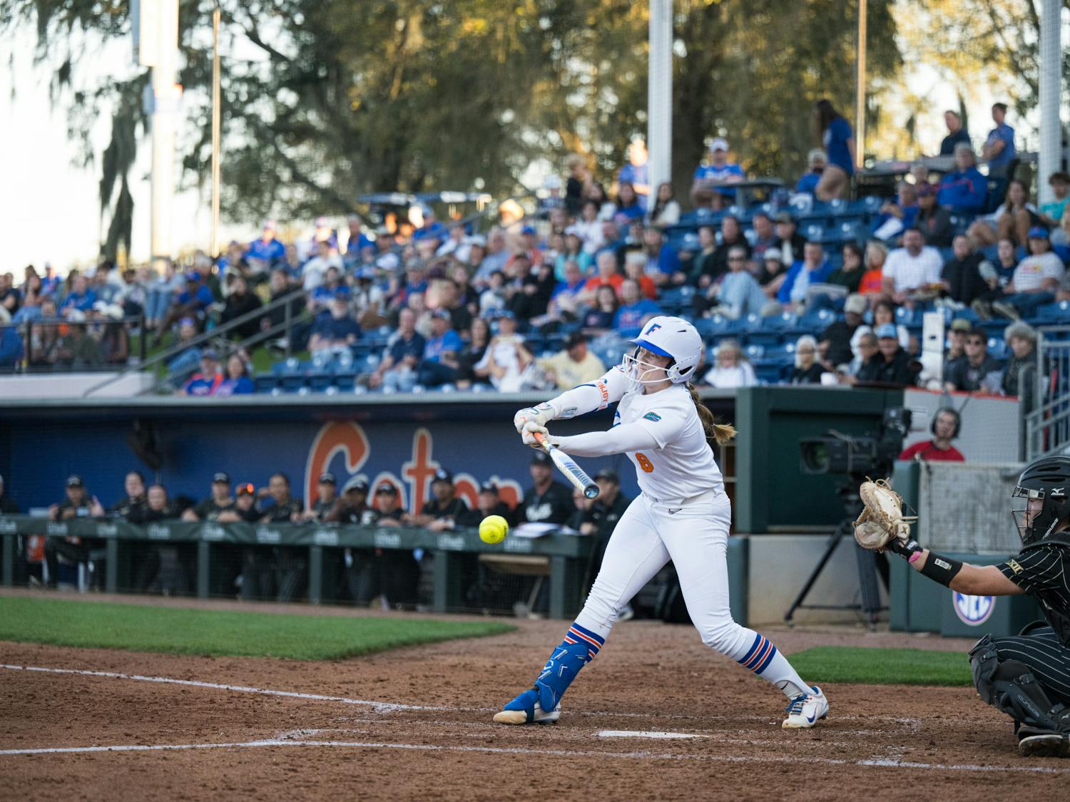 Florida Gators catcher Jocelyn Erickson (8) swings in a softball game against UCF in Gainesville, Fla., on Wednesday, March 12, 2025.