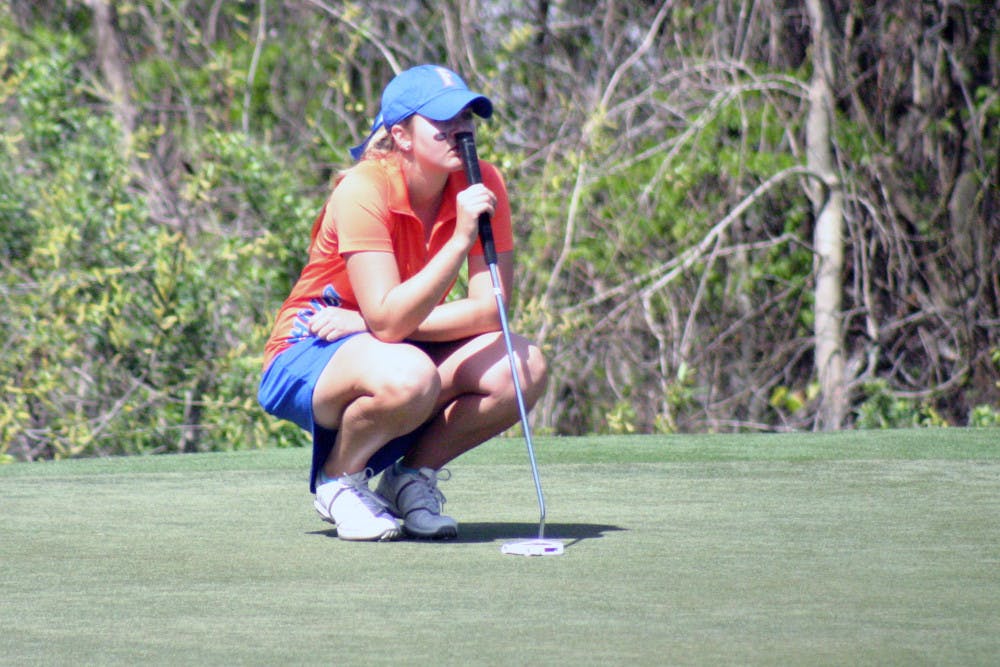 <p>Kelly Grassel lines up a shot during the 2015 SunTrust Gator Invitational on UF's Mark Bostick Golf Course.</p>