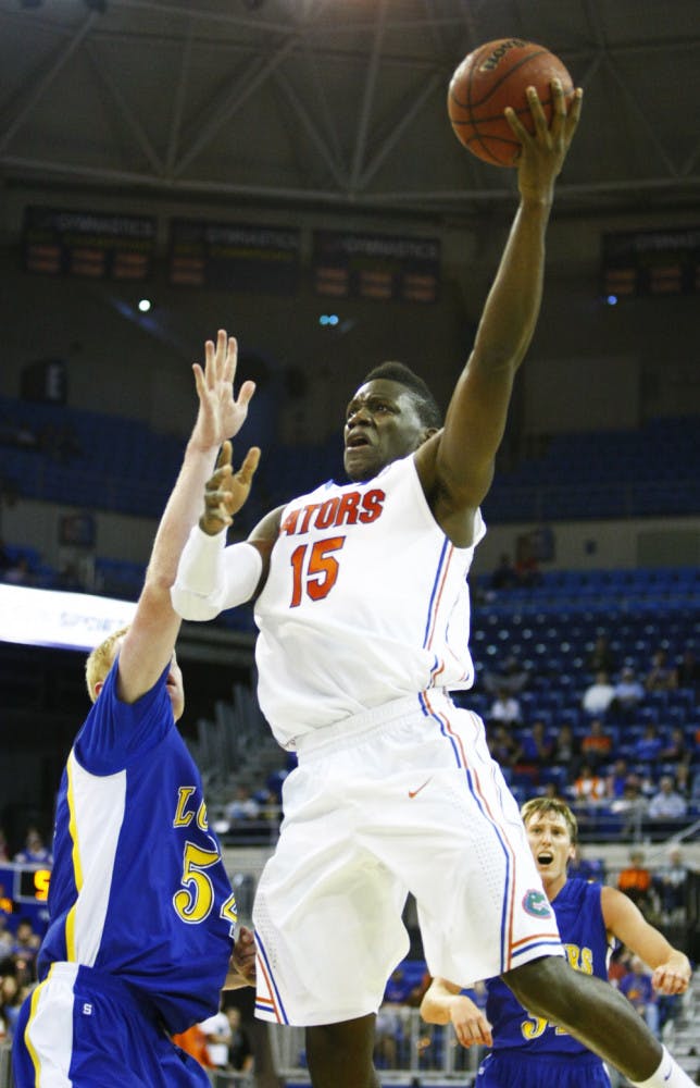 Forward Will Yeguete (15) attempts a shot in UF’s exhibition against Nebraska-Kearney on Thursday.
