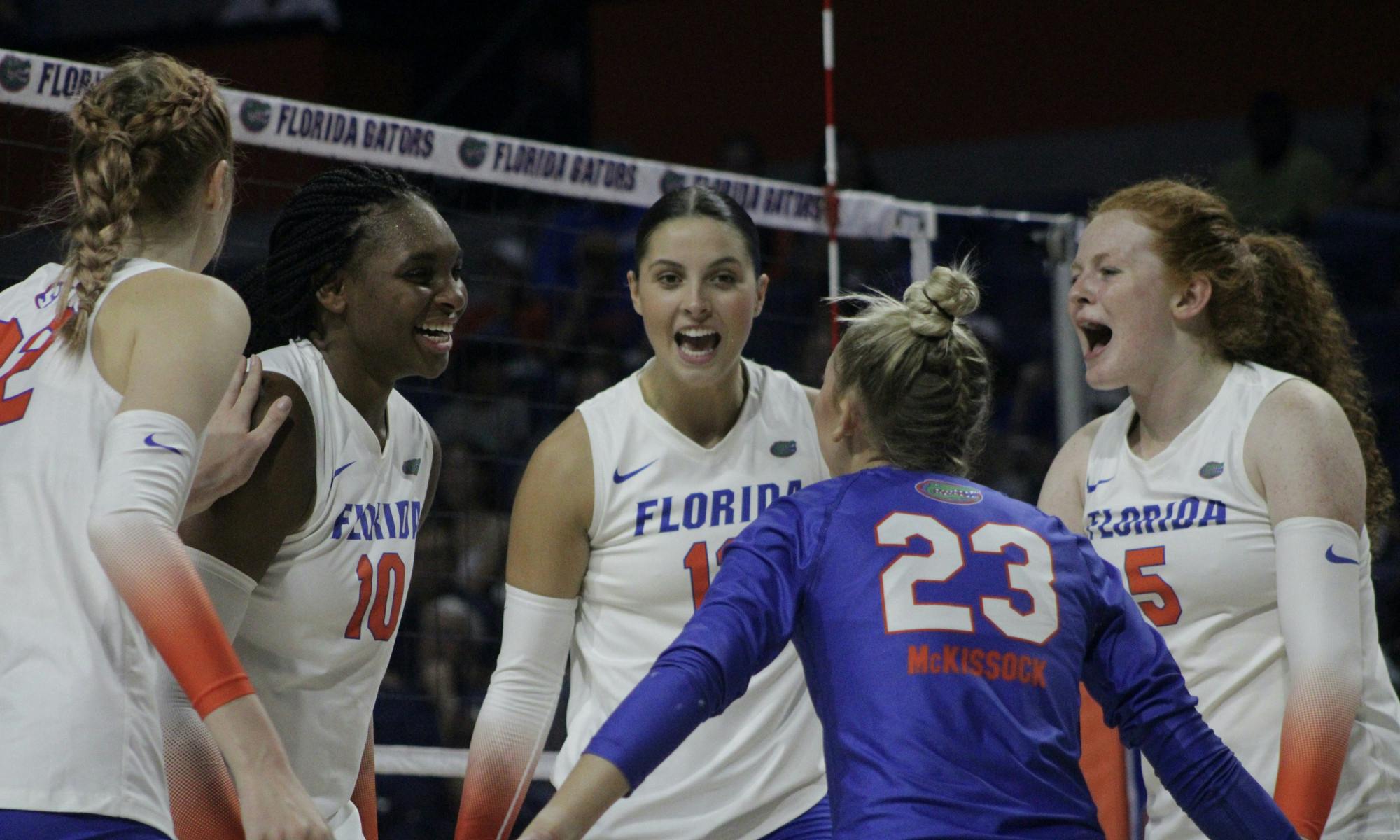 The Florida volleyball team celebrates during a match against the Virginia Cavaliers Aug. 27, 2021.