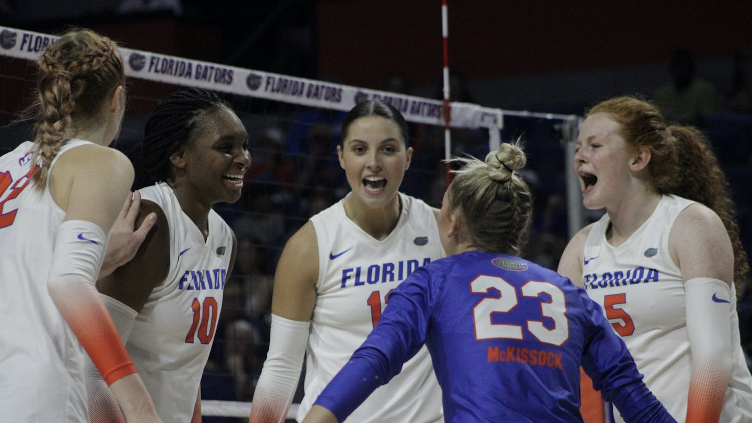The Florida volleyball team celebrates during a match against the Virginia Cavaliers Aug. 27, 2021.