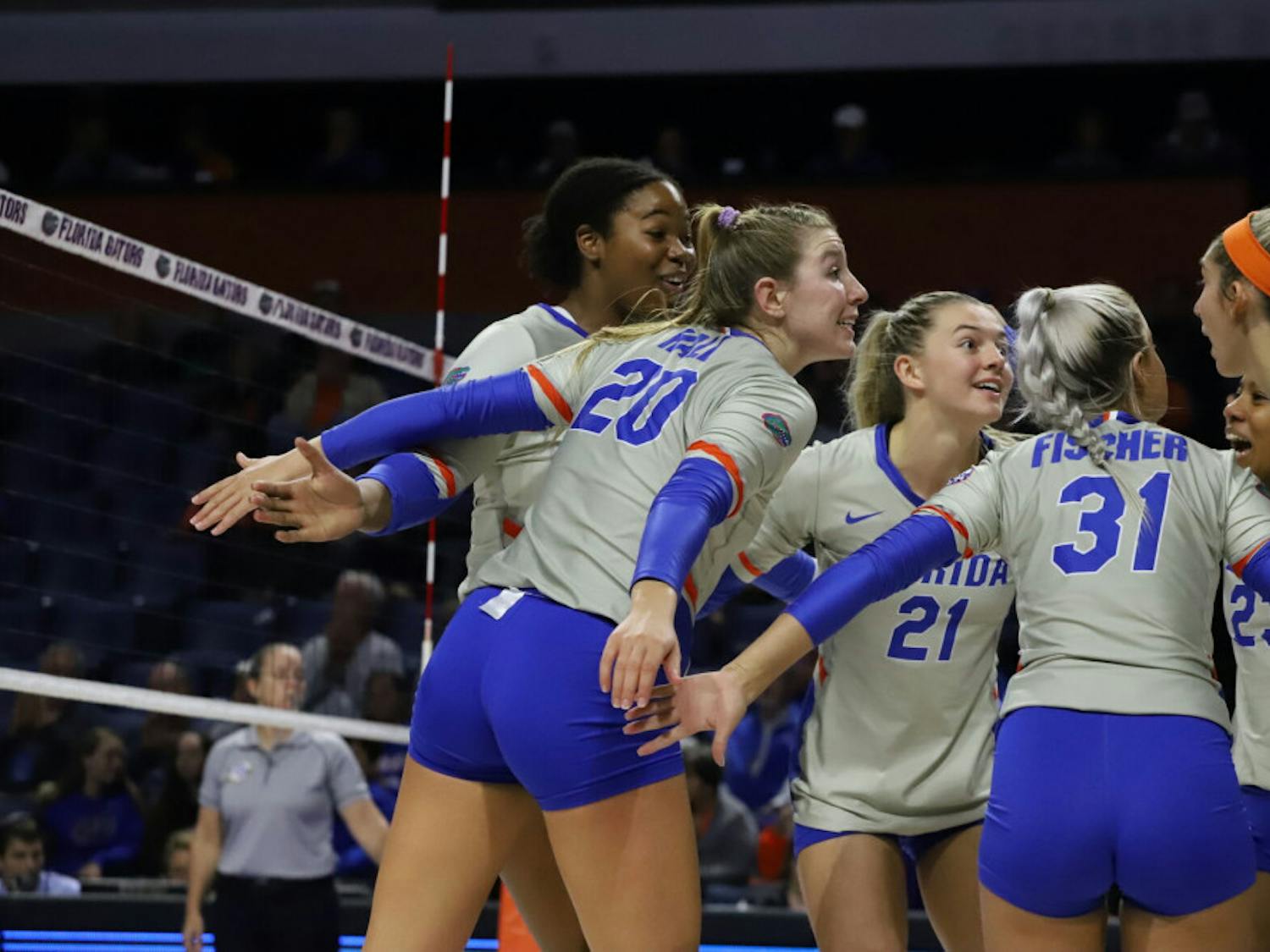 The Florida volleyball team huddles in a game against LSU in 2019. Florida fell to Stanford Tuesday night 3-1. 