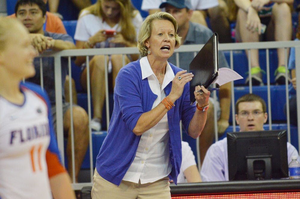 UF coach Mary Wise calls out a play during Florida's 3-2 win against Oklahoma on Aug. 30 in the O'Connell Center.