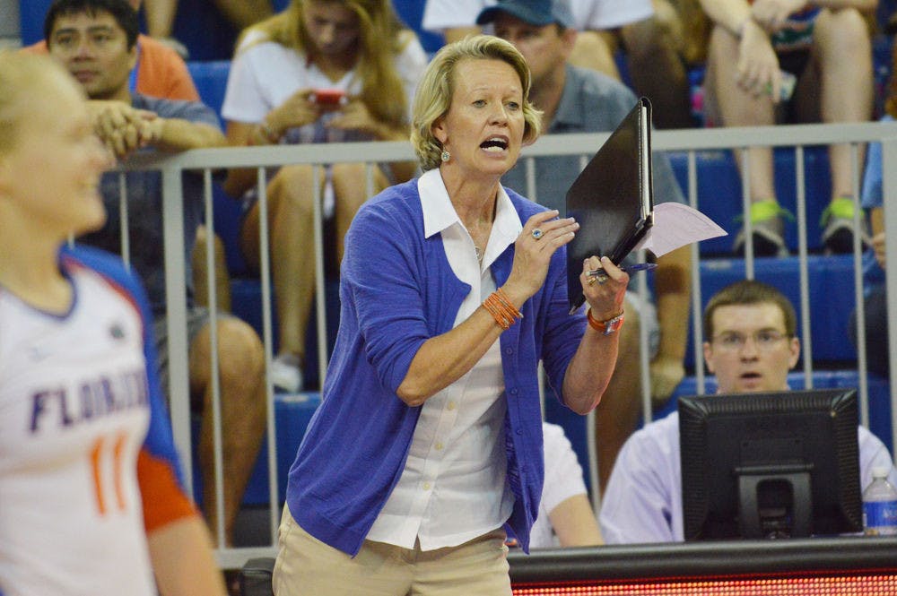 <p>UF coach Mary Wise calls out a play during Florida's 3-2 win against Oklahoma on Aug. 30 in the O'Connell Center.</p>
