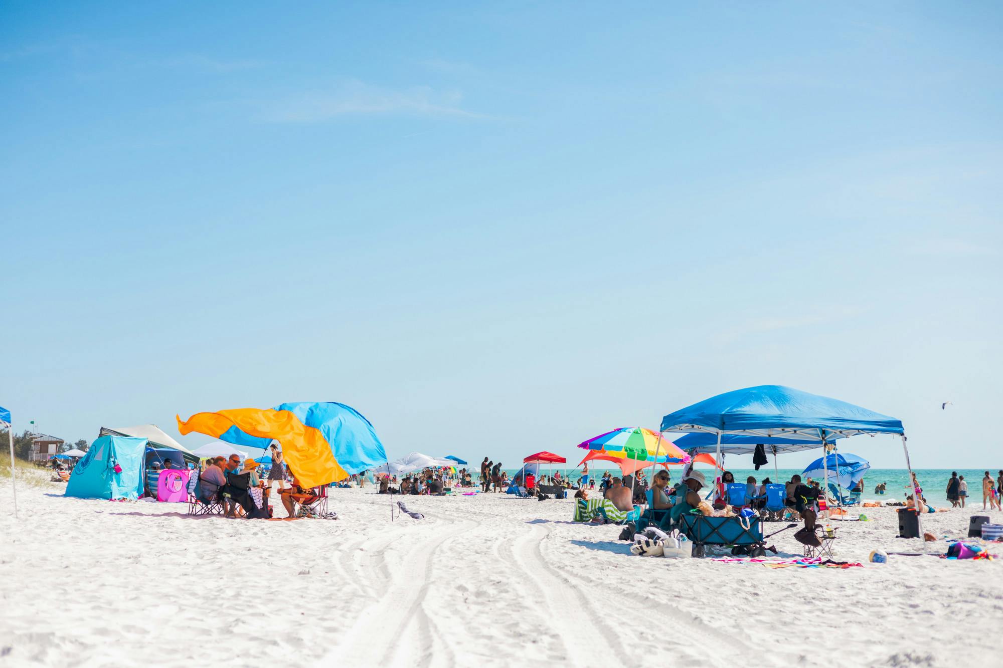Crowds gather at Bradenton Beach on Friday, March 15, 2024.
