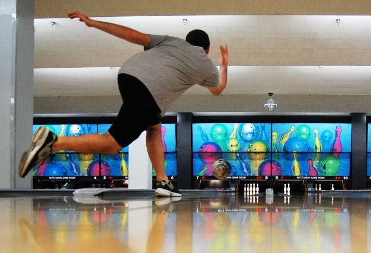 Tyler Wells, 18-year-old biology freshman, sets up for a strike at the Reitz Union Game Room on Thursday. The UF Bowling Club meets Tuesdays and Thursdays at 6 p.m.
