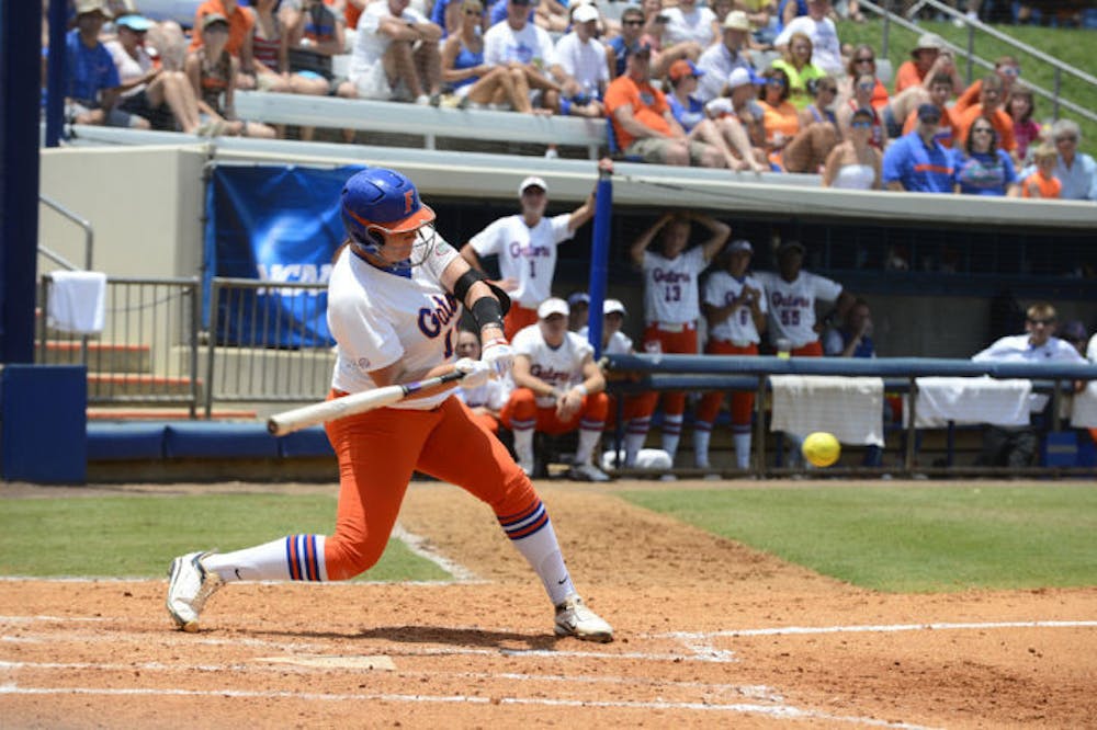 <p>Lauren Haeger swings at a pitch during Florida’s 11-1 win against USF on May 18, 2013, at Katie Seashole Pressly Stadium.</p>