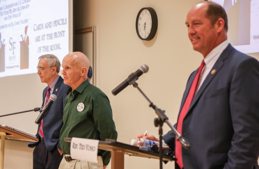 From left: U.S. congressional candidates Democrat Ken McGurn, independent Tom Wells and Republican Ted Yoho debated on Thursday evening at Santa Fe College during the Candidate Forums event, moderated by David Tegeder. 