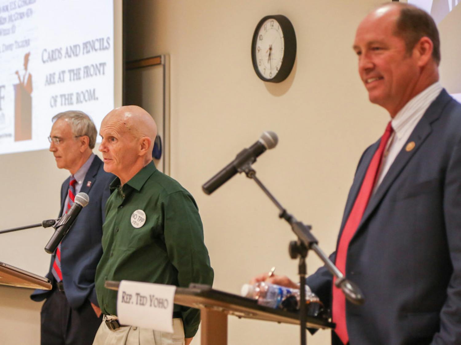 From left: U.S. congressional candidates Democrat Ken McGurn, independent Tom Wells and Republican Ted Yoho debated on Thursday evening at Santa Fe College during the Candidate Forums event, moderated by David Tegeder. 