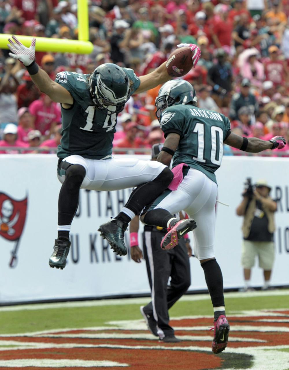 <p>Riley Cooper (14) celebrates with DeSean Jackson (10) after scoring a touchdown against the Tampa Bay Buccaneers on Sunday in Tampa.</p>