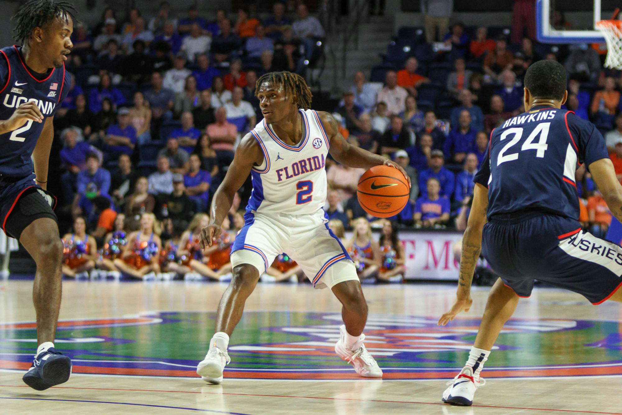 Florida guard Trey Bonham dribbles the ball in the Gators&#x27; 75-54 loss to the Connecticut Huskies Wednesday, Dec. 7, 2022.