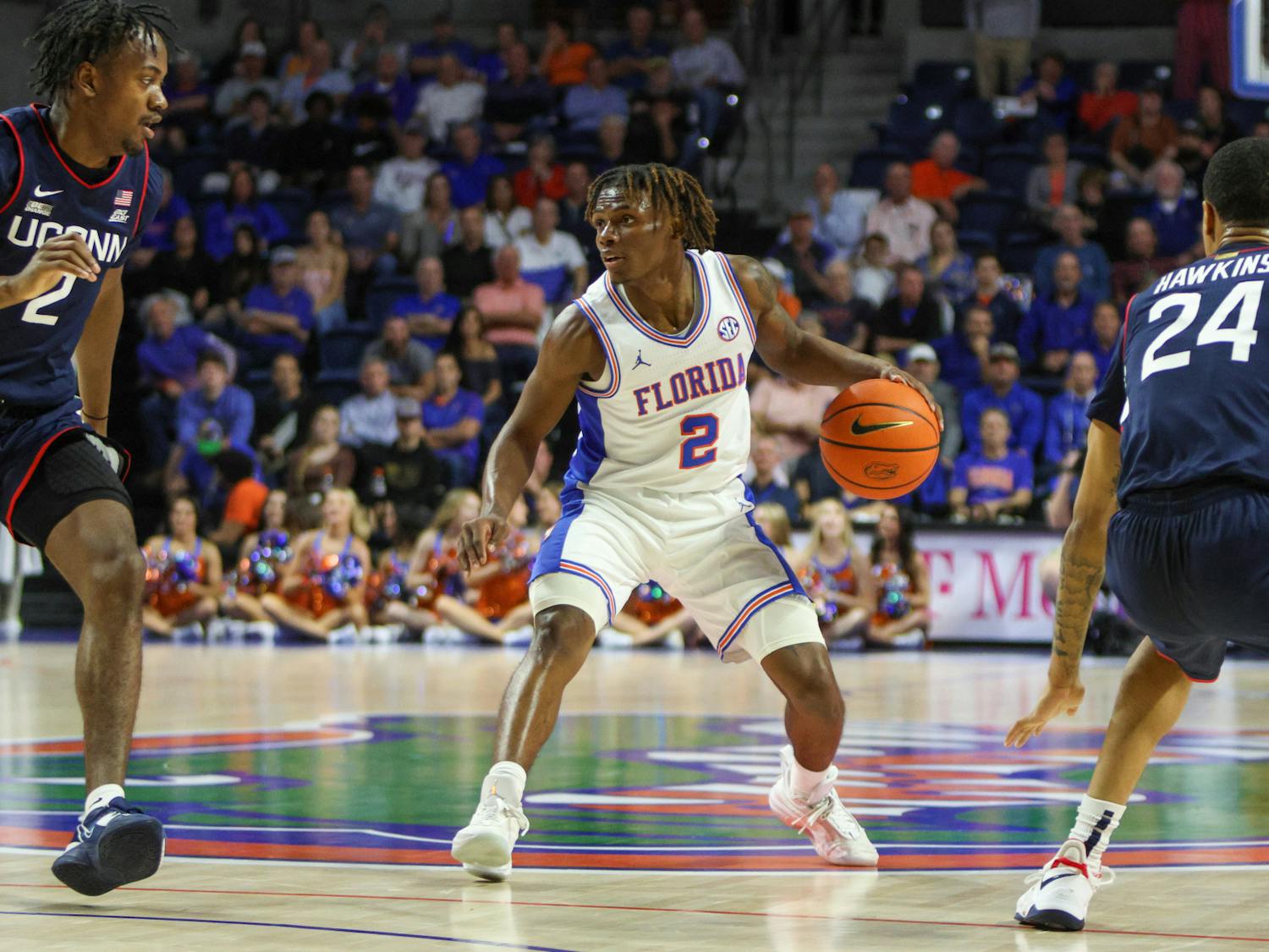 Florida guard Trey Bonham dribbles the ball in the Gators' 75-54 loss to the Connecticut Huskies Wednesday, Dec. 7, 2022.