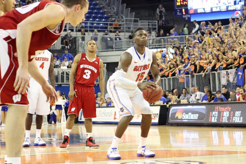 <p class="p1"><span class="s1">Junior forward Will Yeguete (15) prepares to shoot a free throw during Florida’s 74-56 win against Wisconsin on Nov. 14 in the O’Connell Center.</span></p>