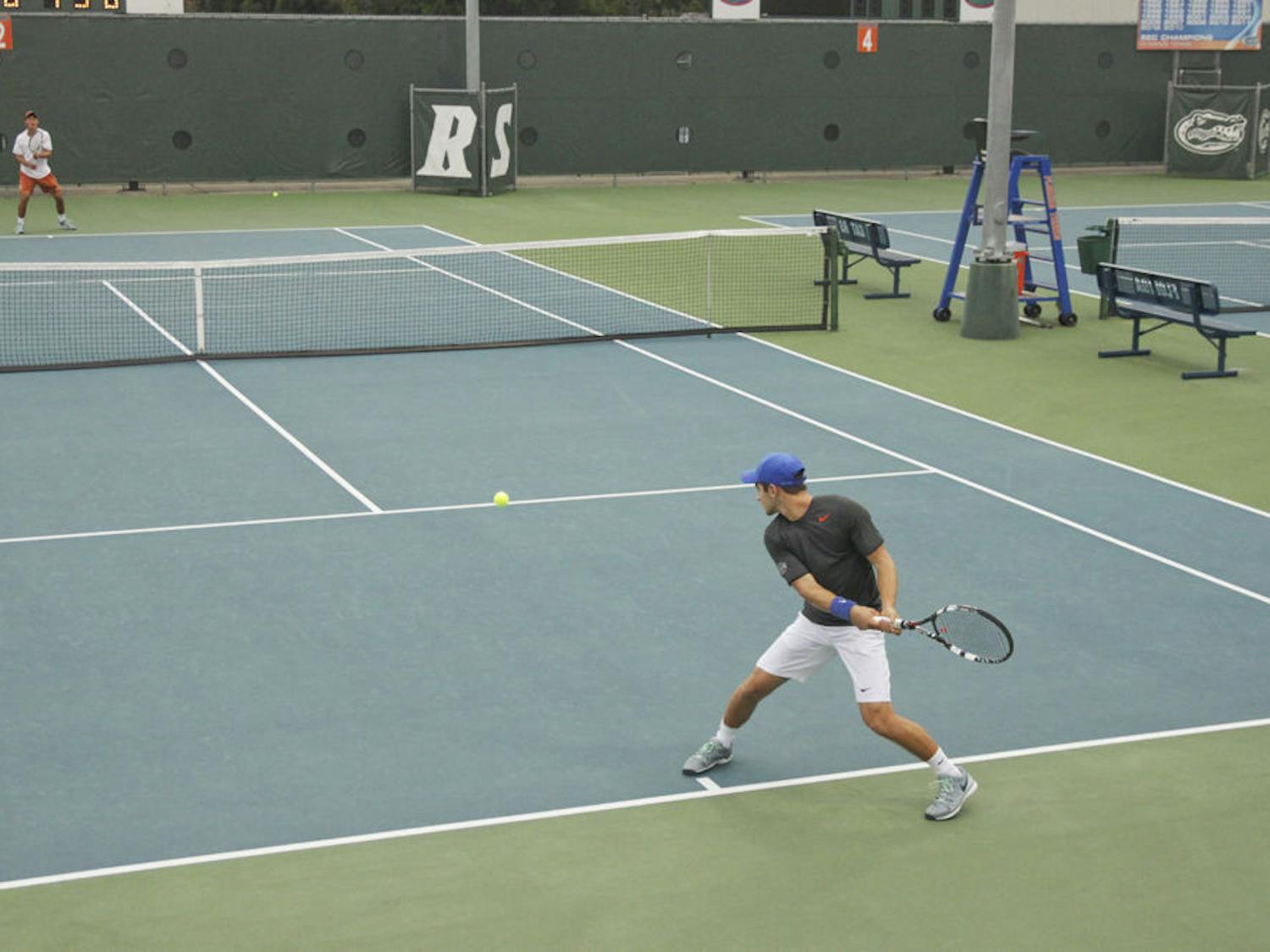 Elliot Orkin returns a ball during the Florida Invitational at UF's Ring Tennis Complex.