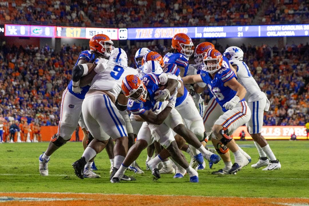 Florida Gators running back Jadan Baugh (13) rushes the ball during the first half at Steve Spurrier-Florida Field at Ben Hill Griffin Stadium on Saturday, October 19, 2024.