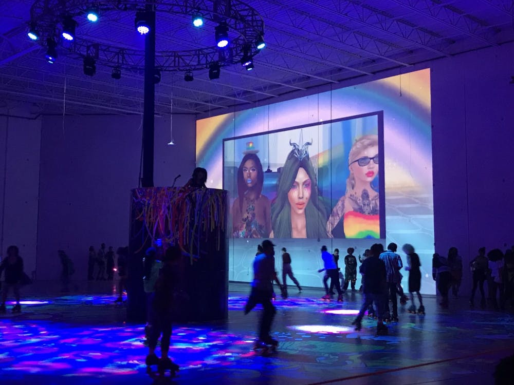 The Skate Space area allowed for attendees to rollerblade around an elevated DJ.&nbsp;