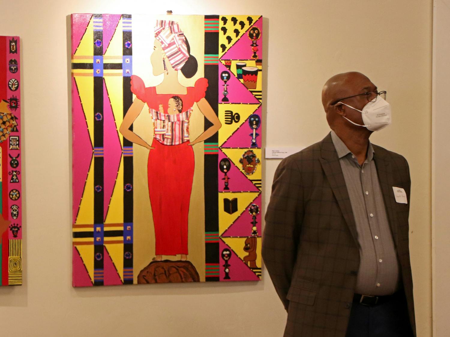 Kenneth Nunn, UF law professor, listens to a speech during the Cotton Club Museum and Cultural Center's re-opening reception on Sunday, Nov. 14, 2021. 