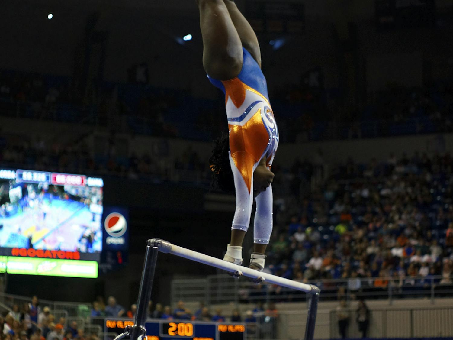 Alicia Boren performs on the uneven parallel bars during Florida's win against Alabama on Jan. 29, 2016, in the O'Connell Center.