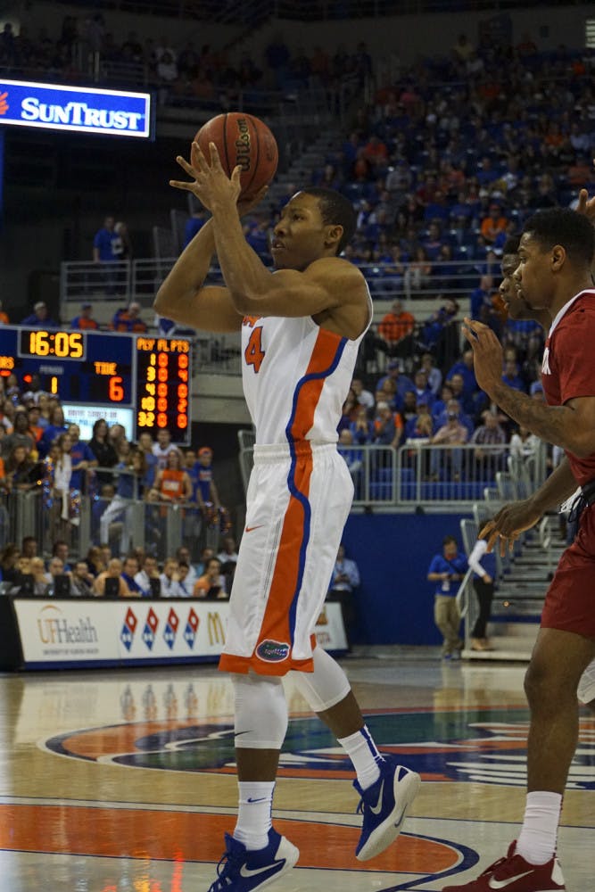 UF guard KeVaughn Allen takes a shot during Florida's 61-55 loss to Alabama on Feb. 13, 2016, in the O'Connell Center.