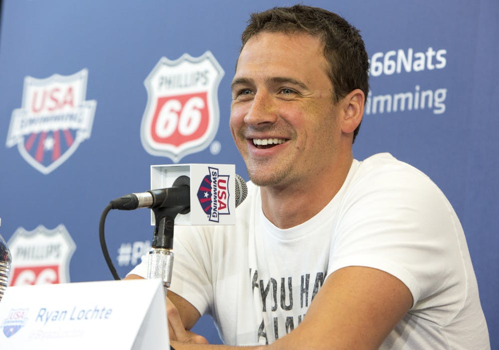 Olympic gold medalist Ryan Lochte smiles as he takes questions from the media at the U.S. swimming nationals news conference in Irvine, Calif., on Tuesday.