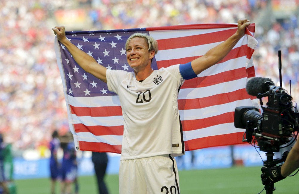 Abby Wambach, a UF alumna, proudly stands as a 2015 FIFA Women’s World Cup champion after the U.S. women’s national team won the games in Canada. Wambach will speak at the Phillips Center for the Performing Arts on Nov. 3 at 8 p.m.